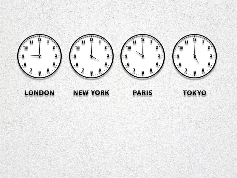 four clocks showing different time zones